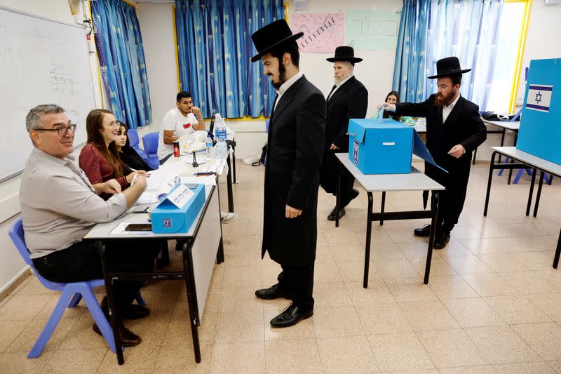 Israelis cast their ballots during Israel's general election in a polling station in Ashdod