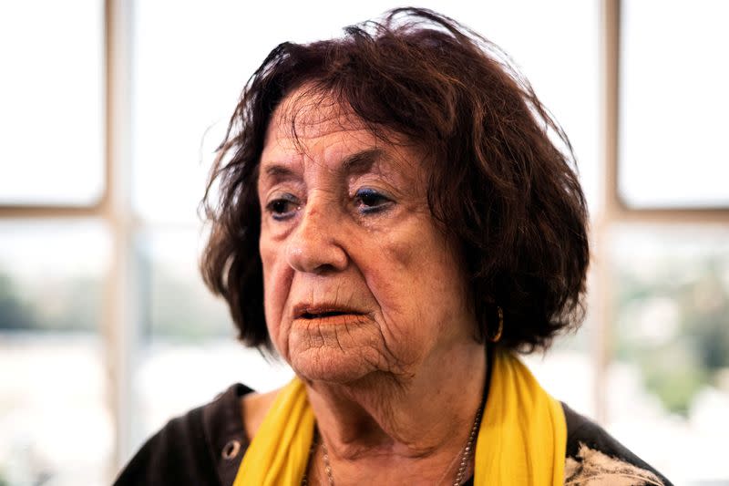 Holocaust survivor, Bellha Haim, 86, who was a child in Poland when her family fled the Nazis, looks on during an interview with Reuters in Herzliya
