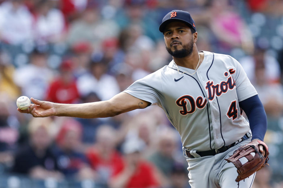 Detroit Tigers third baseman Jeimer Candelario throws out Cleveland Guardians' Amed Rosario at first base during the fifth inning in the first baseball game of a doubleheader, Monday, Aug. 15, 2022, in Cleveland. (AP Photo/Ron Schwane)