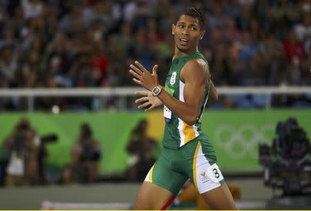 2016 Rio Olympics - Athletics - Final - Men's 400m Final - Olympic Stadium - Rio de Janeiro, Brazil - 14/08/2016. Wayde van Niekerk (RSA) of South Africa competes on the way to setting a new world record. REUTERS/Kai Pfaffenbach Picture Supplied by Action Images