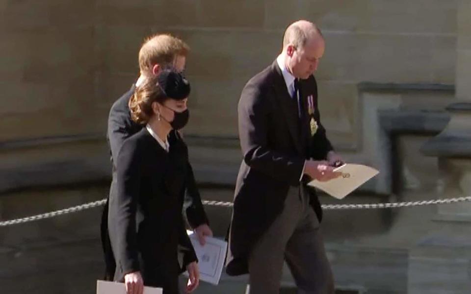 Moments after leaving the funeral service, Kate walked with William and Harry, gradually stepping back and allowing them to talk - pixel GRG