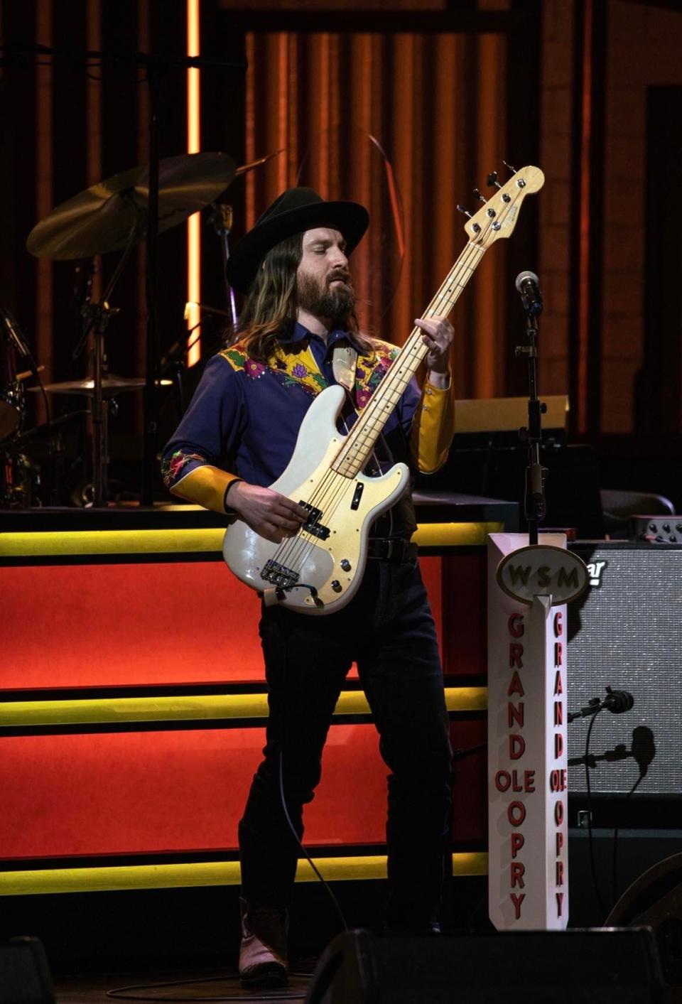 Kevin McManus, a former member of rock bands The Outside Voices and The Buffalo Ryders, is now the bass player for The Shootouts, a Northeast Ohio-based country and honky-tonk band. McManus is shown performing with the band last month at the Grand Ole Opry in Nashville.
