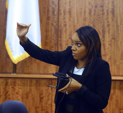 Shayanna Jenkins describes the size of a box as she testifies in court during. (AP)