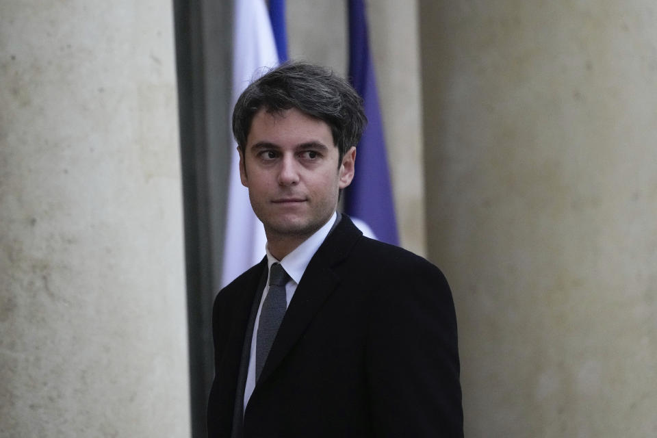 New French prime minister Gabriel Attal arrives to attend the weekly cabinet meeting after a cabinet reshuffle at the Elysee Palace in Paris, Friday, Jan. 12, 2024 . (AP Photo/Michel Euler)