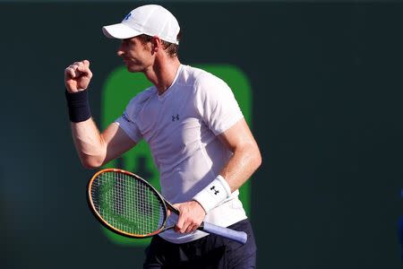 Apr 1, 2015; Key Biscayne, FL, USA; Andy Murray celebrates after his match against Dominic Thiem (not pictured) on day ten of the Miami Open at Crandon Park Tennis Center. Murray won 3-6, 6-4, 6-1. Mandatory Credit: Geoff Burke-USA TODAY