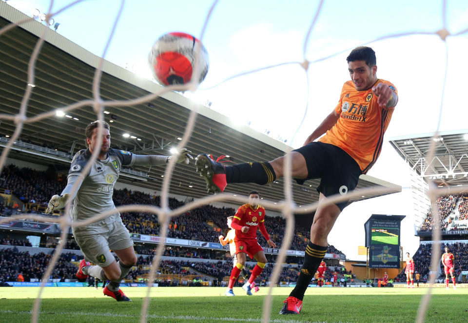 WOLVERHAMPTON, ENGLAND - FEBRUARY 23: Raul Jimenez of Wolverhampton Wanderers scores his team's third goal past Tim Krul of Norwich City during the Premier League match between Wolverhampton Wanderers and Norwich City at Molineux on February 23, 2020 in Wolverhampton, United Kingdom. (Photo by Marc Atkins/Getty Images)