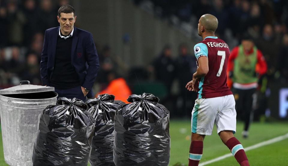 STRATFORD, ENGLAND - JANUARY 02: Slaven Bilic, Manager of West Ham United (L) looks on as Sofiane Feghouli of West Ham United (R) walks off after being sent off during the Premier League match between West Ham United and Manchester United at London Stadium on January 2, 2017 in Stratford, England. (Photo by Ian Walton/Getty Images)