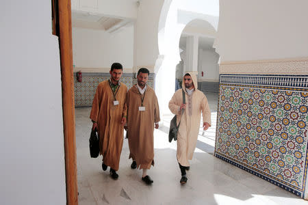 Students walk to attend religious courses at Mohammed VI Institute for training Imams in Rabat, Morocco April 16, 2019. REUTERS/Youssef Boudlal