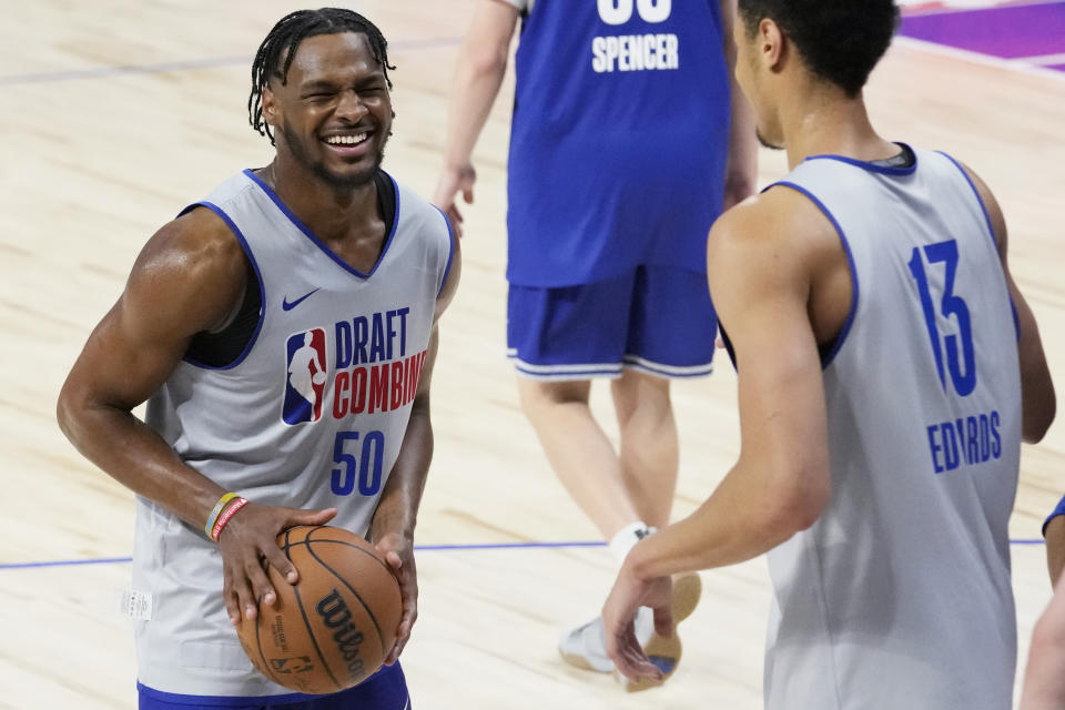 Bronny James smiles as he participates in the 2024 NBA basketball Draft Combine in Chicago, Tuesday, May 14, 2024. (AP Photo/Nam Y. Huh)