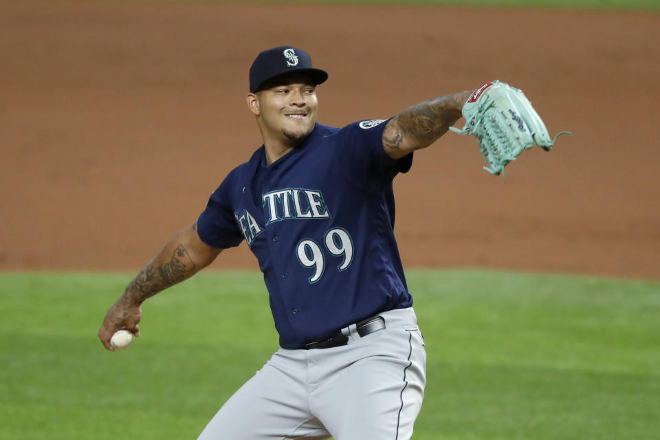 Seattle Mariners starting pitcher Taijuan Walker (99) throws to the Texas Rangers in the first inning of a baseball game in Arlington, Texas, Wednesday, Aug. 12, 2020. (AP Photo/Tony Gutierrez)