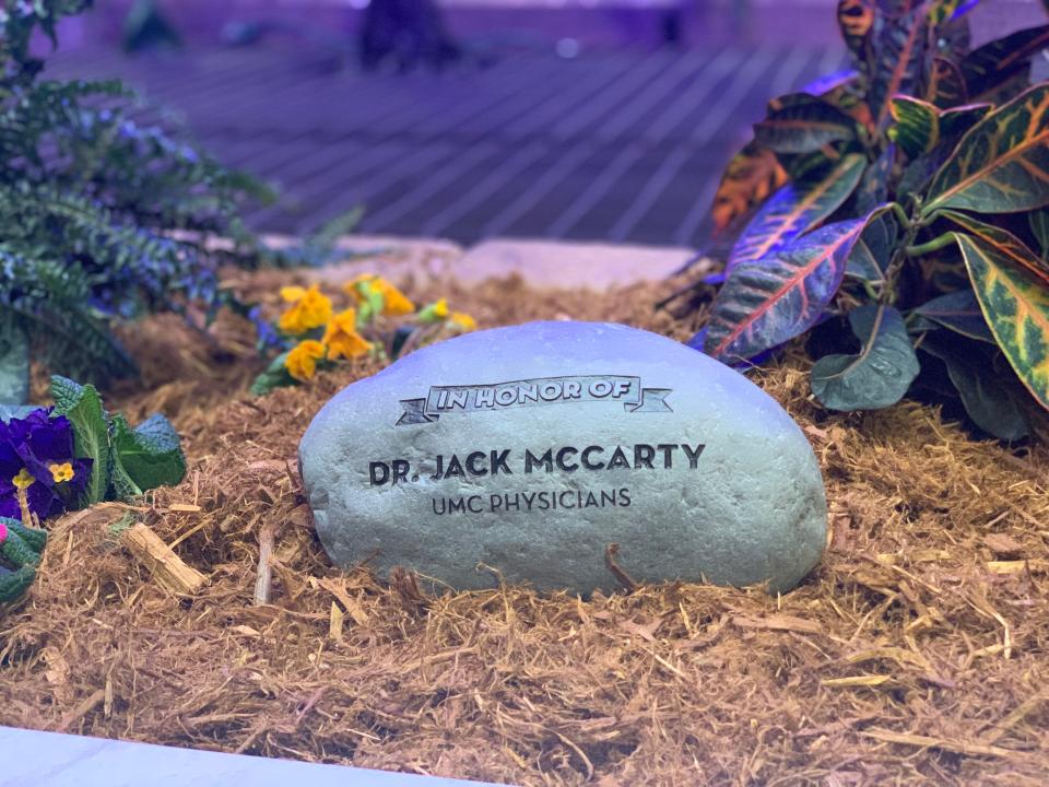 The garden has a memorial marker to honor each employee; Harold Loveless Operating room, Barbara Jenkins Armstrong Food and Nutrition, Dr. Jack McCarty UMC Physicians, and Michael Leal CICU, who lost their lives due to COVID-19.