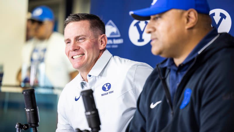 New BYU associate head coach and defensive coordinator Jay Hill, left, meets with the media with head coach Kalani Sitake on Dec. 7, 2022.