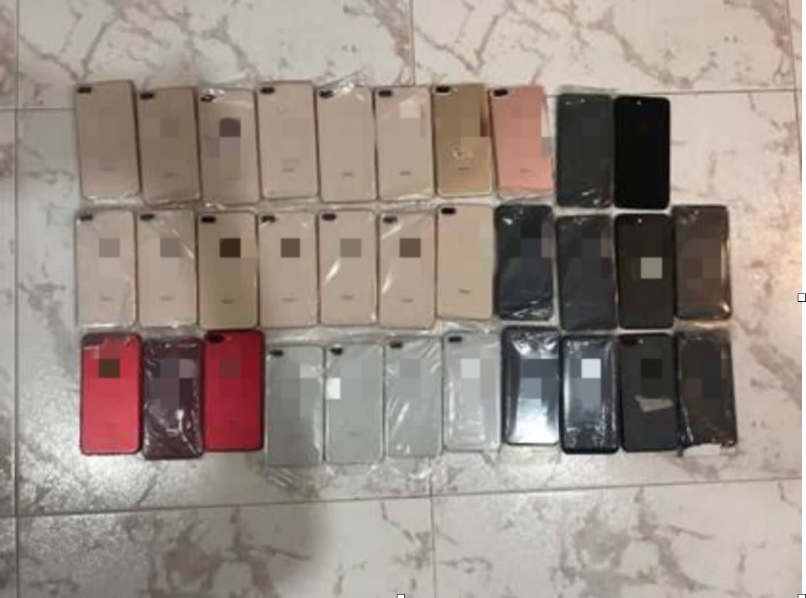 iPhones seized from Ng Shu Kian. court and crime 