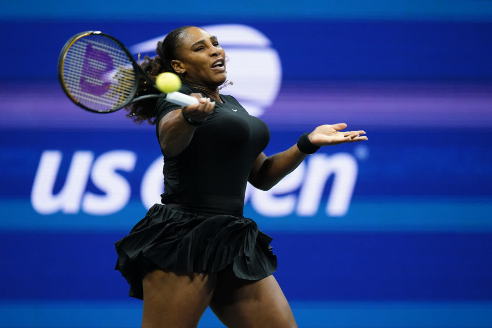 Serena Williams, of the United States, returns a shot during her first-round doubles match with Venus Williams, against Lucie Hradecká and Linda Nosková, of the Czech Republic, at the U.S. Open tennis championships, Thursday, Sept. 1, 2022, in New York. (AP Photo/Frank Franklin II)