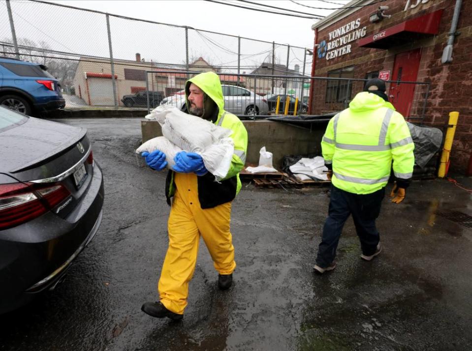 Yonkers Department of Public Works employees delivered sandbags to residents on Saturday. Mark Vergari/The Journal News / USA TODAY NETWORK