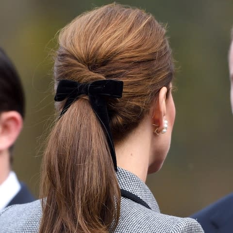 Catherine, Duchess of Cambridge, hair detail, arrives at Leicester City Football Club to pay tribute to those who were tragically killed in the helicopter crash at the King Power Stadium on November 28, 2018 in Leicester, United Kingdom - Credit: Karwai Tang/WireImage