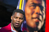 Republican candidate for U.S. Senate Herschel Walker speaks during a campaign rally Tuesday, Nov. 29, 2022, in Greensboro, Ga. Walker is in a runoff election with incumbent Democratic Sen. Raphael Warnock. (AP Photo/John Bazemore)