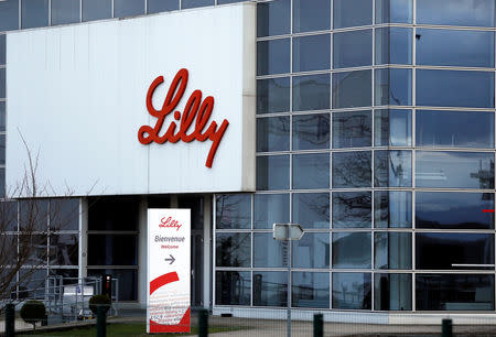 FILE PHOTO: The logo of Lilly on a wall of Lilly France, part of Eli Lilly and Co, in Fegersheim near Strasbourg, France, February 1, 2018. Picture taken February 1, 2018. REUTERS/Vincent Kessler