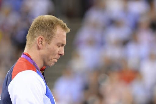 El ciclista británico Chris Hoy se emociona al recibir la medalla de oro en la modalidad de pista, el 7 de agosto. Preguntado sobre su momento preferido en estos Juegos, Rogge aseguró tener un sentimiento compartido entre el récord de los 800 metros del keniano David Rudisha y la sexta medalla de oro ganada por el ciclista británico Chris Hoy. (AFP | leon neal)