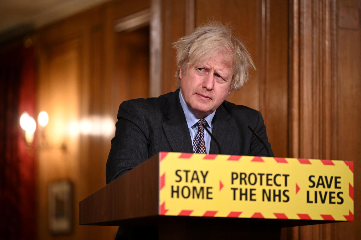 Britain's Prime Minister Boris Johnson attends a virtual press conference inside 10 Downing Street in central London on February 22, 2021, after he earlier set out the Government's roadmap out of the third Covid-19 lockdown. - British Prime Minister Boris Johnson on Monday set out a four-step plan to ease coronavirus restrictions, expressing hope that life could get back to normal by the end of June. In a statement to parliament, he outlined a 