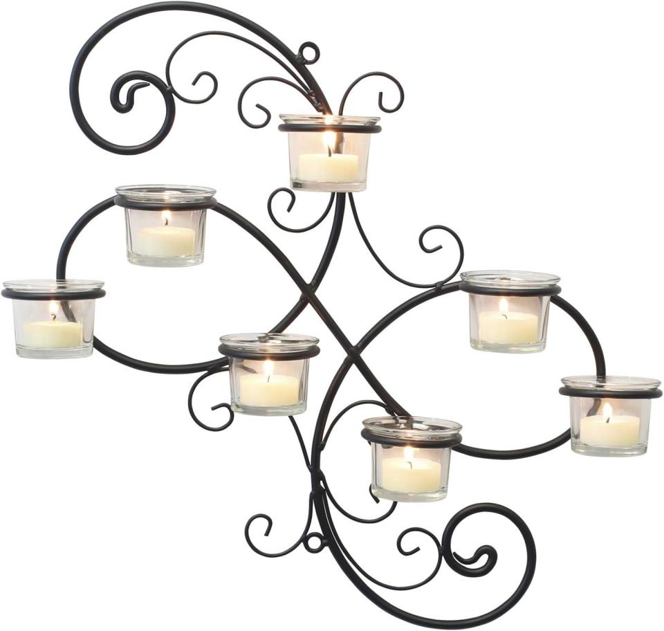 Stonebriar BR-CN-5387A Decorative Black Scrolled Ivy Metal Tea Light Candle Holder Hanging Wall Sconce, 7-tealight. (Photo: Amazon SG)