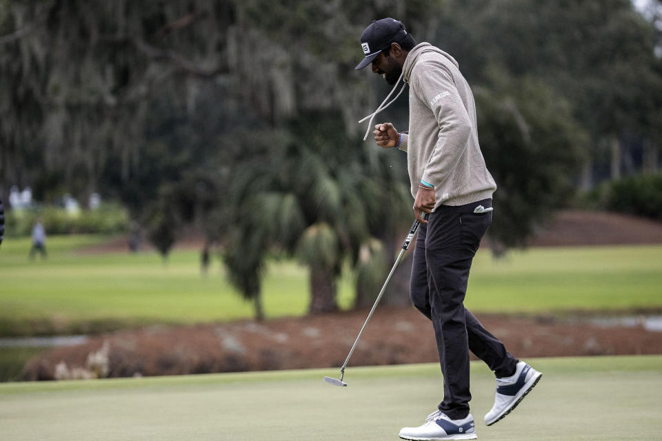 Sahith Theegala reactsafter making a birdie putt on the 17th green during the final round of the RSM Classic golf tournament, Sunday, Nov. 20, 2022, in St. Simons Island, Ga. (AP Photo/Stephen B. Morton)