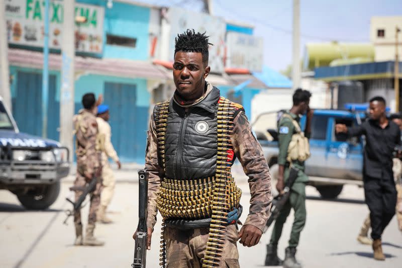 Security officers patrol near the destroyed Hayat Hotel after a deadly 30-hour siege by al-Shabab militants in Mogadishu on Aug. 21, 2022. (Hassan Ali Elmi/AFP via Getty Images)<cite class="op-small">HASSAN ALI ELMI</cite>