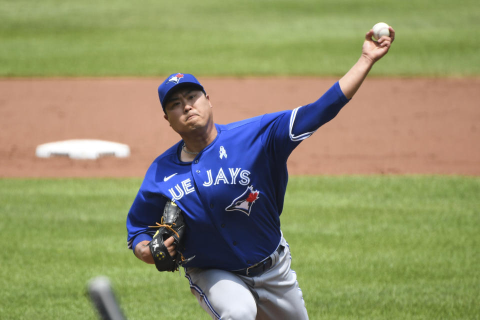 Toronto Blue Jays starting pitcher Hyun Jin Ryu throws a pitch during the first inning of a baseball game against the Baltimore Orioles, Sunday, June 20, 2021, in Baltimore. (AP Photo/Terrance Williams)