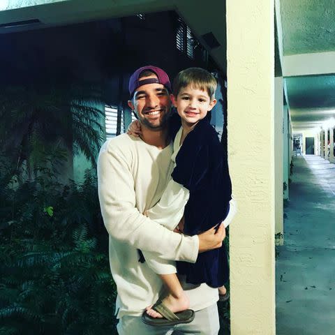 <p>Nick Castellanos Instagram</p> Nick Castellanos and his son, Liam, in December 2017.