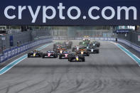 Drivers steer their cars during the Formula One Miami Grand Prix auto race Sunday, May 5, 2024, in Miami Gardens, Fla. (AP Photo/Rebecca Blackwell)