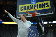 Oregon head coach Dana Altman celebrates as he cuts down part of the net after Oregon defeated Colorado in an NCAA college basketball game in the championship of the Pac-12 tournament Saturday, March 16, 2024, in Las Vegas. (AP Photo/John Locher)