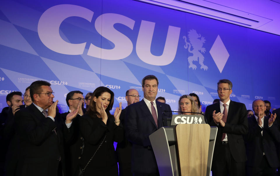 FILE - In this Sunday, Oct. 14, 2019 file photo, Bavarian governor Markus Soeder gives a statement in the state parliament in Munich, Germany, after the polling stations for the Bavarian state elections have closed. A London-based think tank says last year's election in the German state of Bavaria was the subject of concerted social media campaigns designed to benefit a far-right party. (AP Photo/Matthias Schrader)