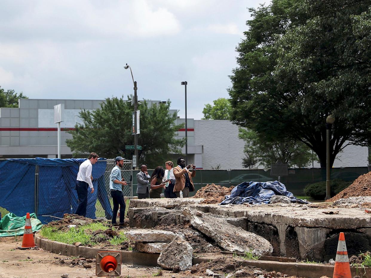 Members of the Memphis Greenspace board take a look at the now former grave of Confederate Gen. Nathan Bedford Forrest, in Memphis, Tenn., on Friday, June 11, 2021. (AP)