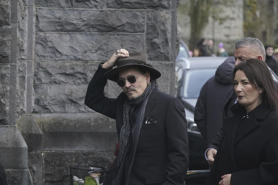 Johnny Depp arrives for the funeral of Shane MacGowan at Saint Mary's of the Rosary Church, Nenagh, Ireland, Friday, Dec. 8, 2023. MacGowan, the singer-songwriter and frontman of The Pogues, best known for their ballad “Fairytale of New York,” died on Thursday, Nov. 30, 2023. He was 65. (Niall Carson/PA via AP)