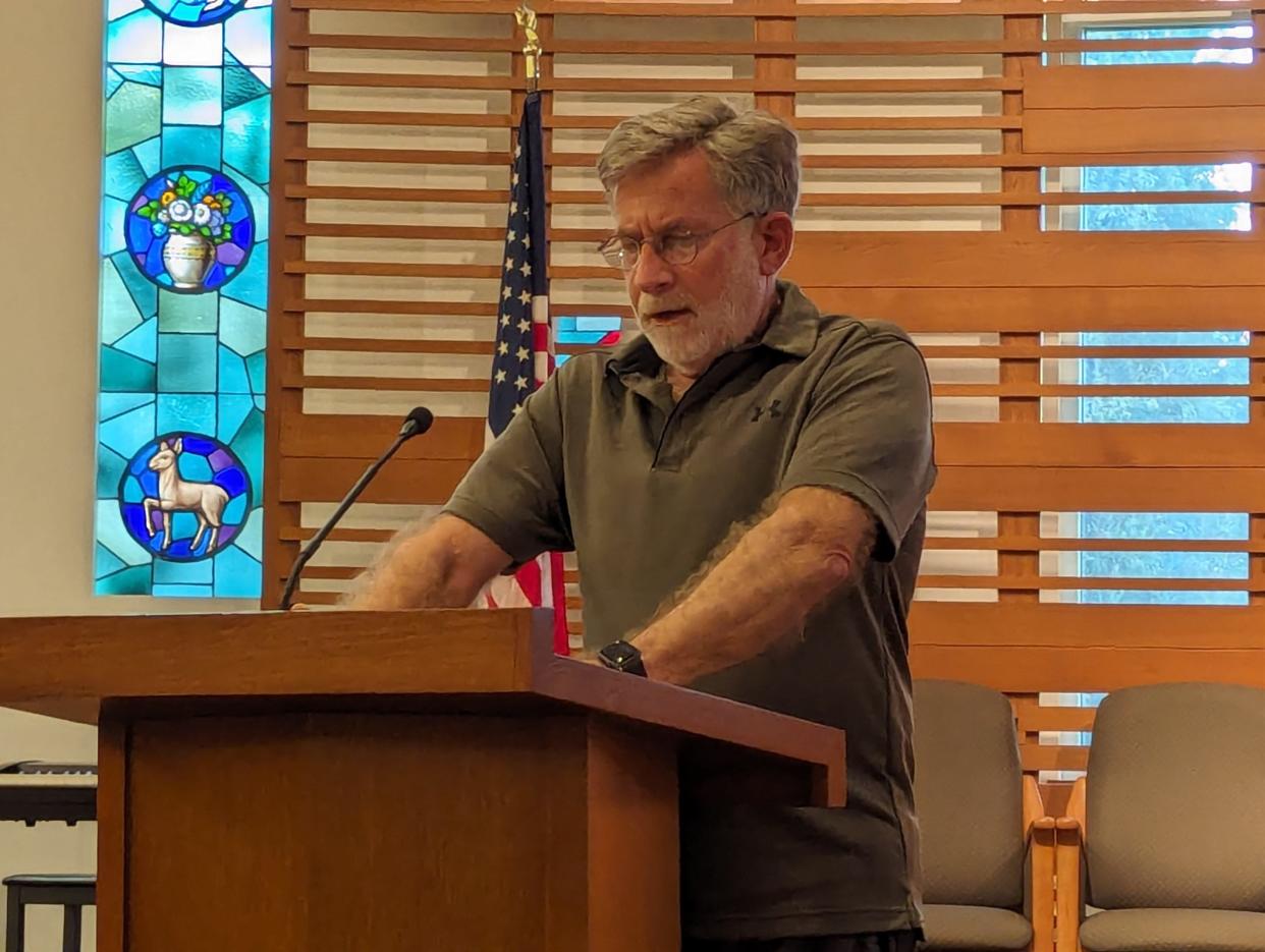 Dr. Marvin Boren, a son of two Holocaust survivors, speaks at the this year's Yom HaShoah observance at Beit Ha'am in Canton.