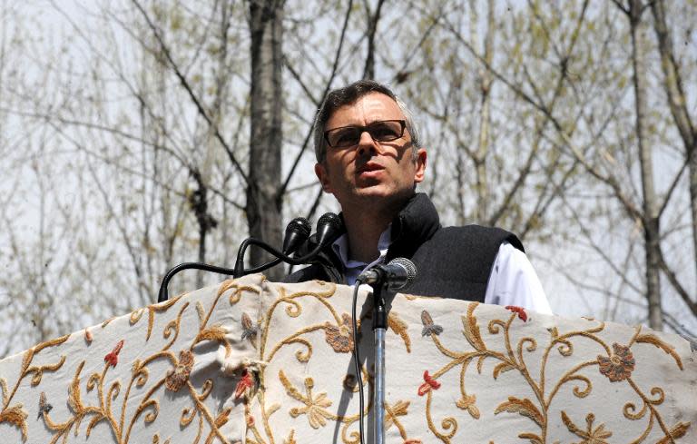 Kashmir Chief Minister Omar Abdullah addresses an election rally on the outskirts of Srinagar on April 8, 2014