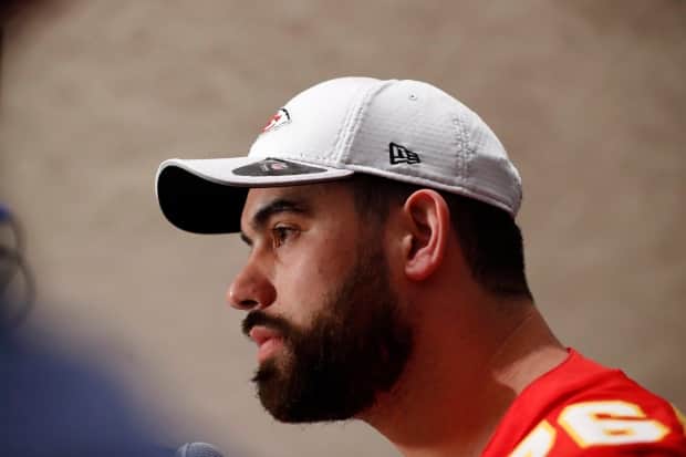 The former McGill University offensive lineman worked as an orderly in a long-term care home in Montreal, marking the first football player to put his career on hold due to COVID-19.  (Brynn Anderson/The Associated Press - image credit)