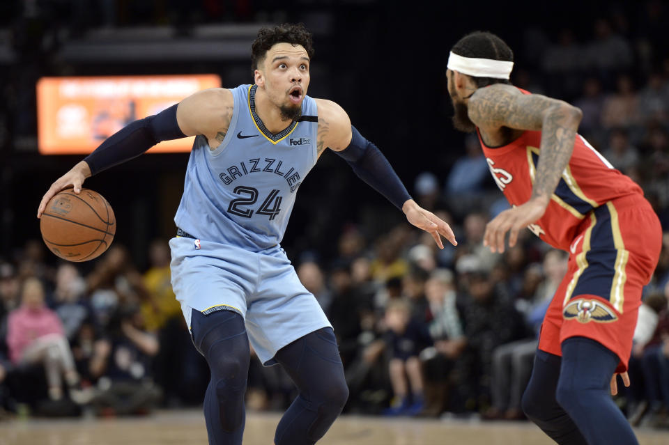 Memphis Grizzlies guard Dillon Brooks (24) handles the ball against New Orleans Pelicans forward Brandon Ingram in the second half of an NBA basketball game Monday, Jan. 20, 2020, in Memphis, Tenn. (AP Photo/Brandon Dill)