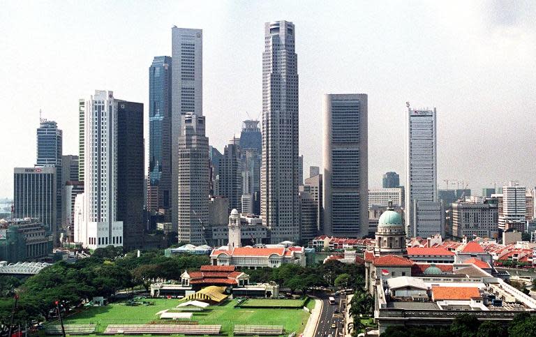 This view shows the financial financial district of Singapore 10 November 1999. Authorities ban a documentary on dissidents, saying it undermines national security