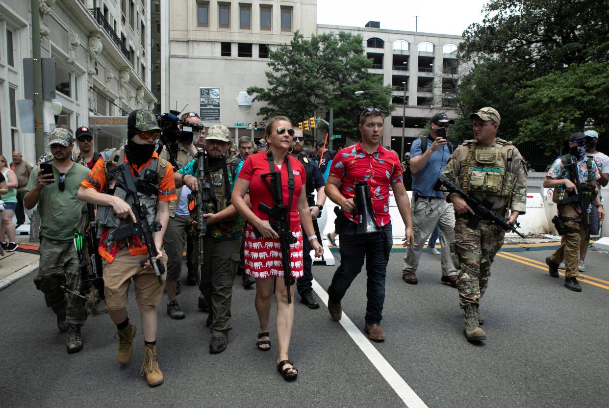 Virginia state Sen. Amanda Chase walks through the crowd at a pro-gun rally in Richmond, Virginia, on July 4, 2020. She also joined the "Stop the Steal" rally in Washington, D.C. on Jan. 6. (Photo: Julia Rendleman / Reuters)