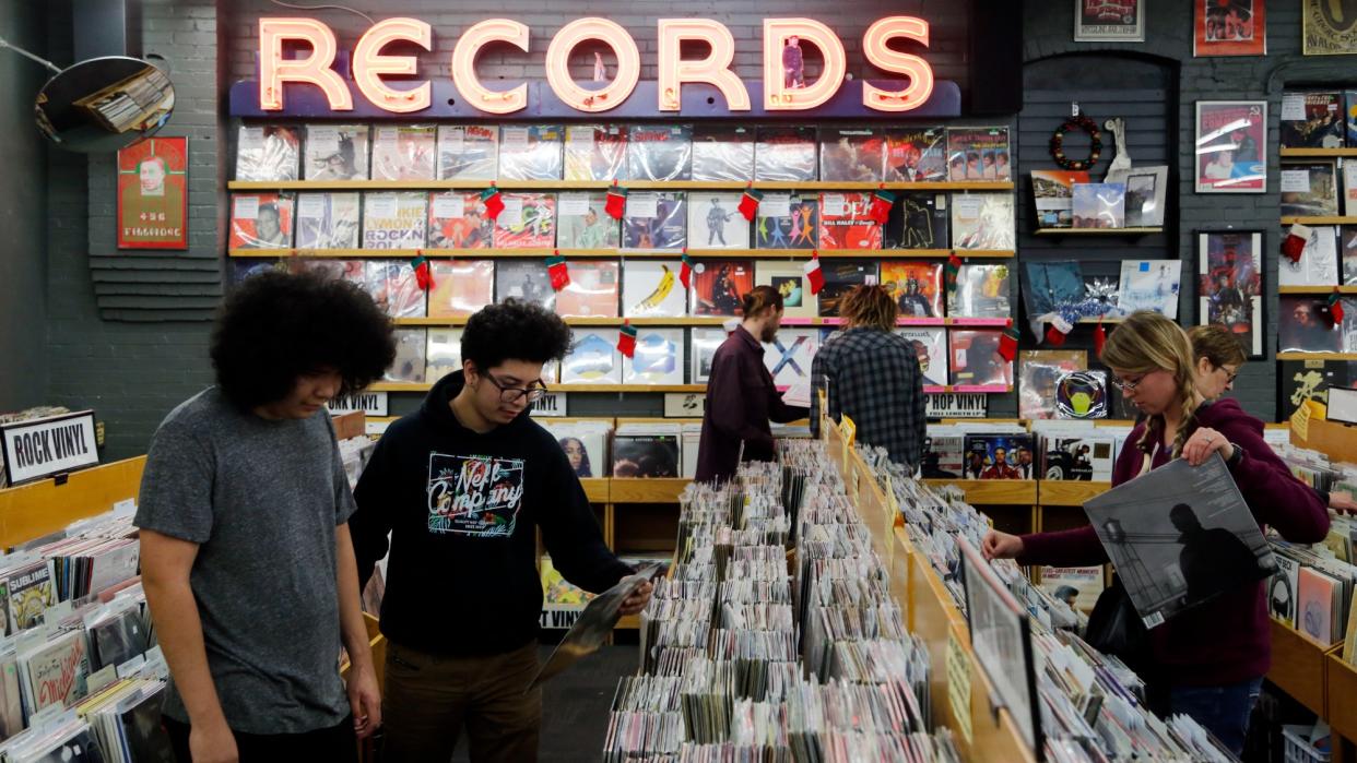  Shoppers peruse The Record Exchange in downtown Boise, Idaho. 