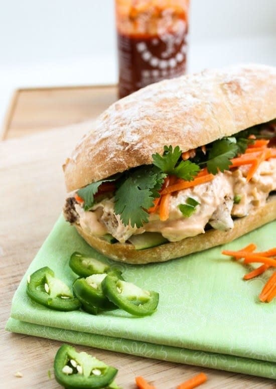 A banh mi made with leftover turkey, vegetables, and spicy Sriracha sauce.