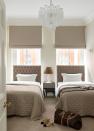 <p>Use your windows as guide posts. In this London apartment, <a href="https://www.elledecor.com/design-decorate/house-interiors/a34599587/nebihe-cihan-london-apartment/" rel="nofollow noopener" target="_blank" data-ylk="slk:Nebihe Cihan" class="link ">Nebihe Cihan</a>, placed twin beds directly under twin windows, giving this guest bedroom a chic, symmetrical feel.</p>