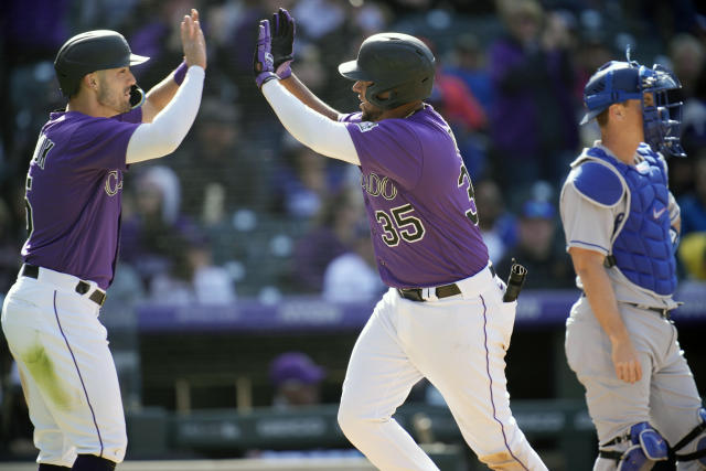 Randal Grichuk takes a homer away from Corey Seager 