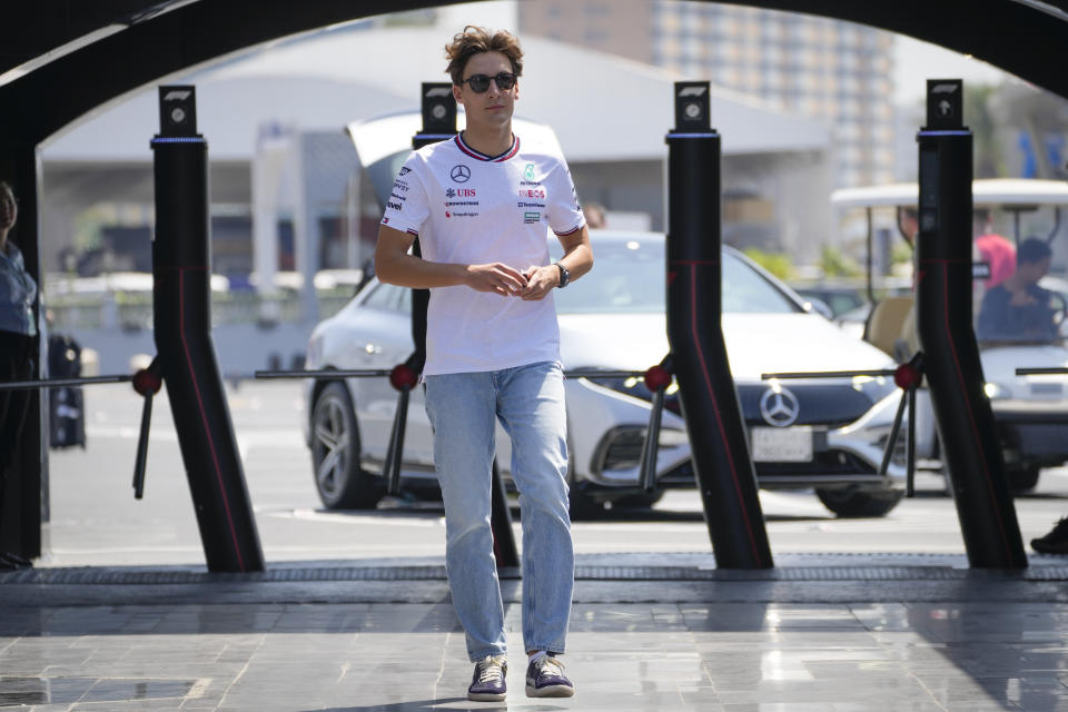 Mercedes driver George Russell of Britain arrives to the paddock ahead of the Formula One Saudi Arabian Grand Prix at the Jeddah Corniche Circuit in Jeddah, Saudi Arabia, Wednesday, March 6, 2024. Saudi Arabian Grand Prix will be held on Saturday, March 9, 2024. (AP Photo/Darko Bandic)