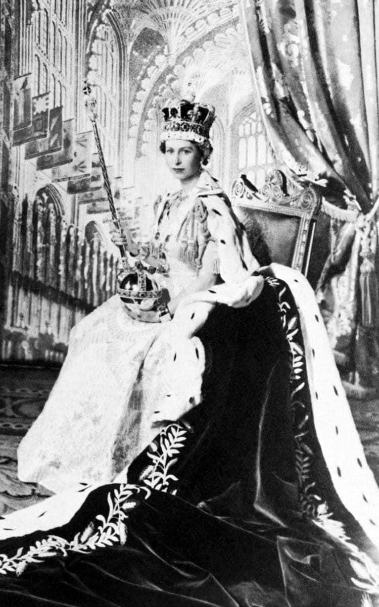 <p>Wearing the Crown Jewels on her Coronation Day at Westminster Abbey.<br><i>[Photo: Getty]</i> </p>