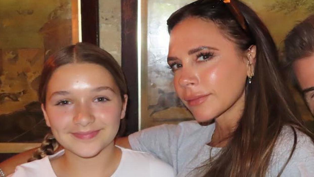 Harper Beckham in white tshirt with mum Victoria  