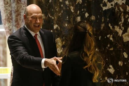 Gary Cohn, Goldman Sachs Group Inc president and chief operating officer, greets Madeleine Westerhout as he arrives for a meeting at Trump Tower to speak with U.S. President-elect Donald Trump in New York, U.S., November 29, 2016. REUTERS/Lucas Jackson