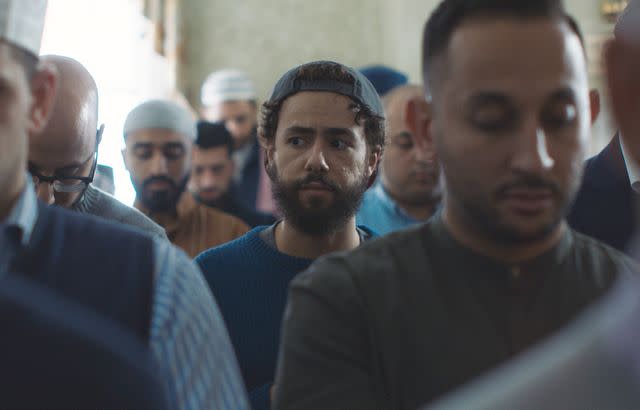 <p>Hulu/Courtesy Everett</p> Ramy Youssef (center) in 'Ramy'