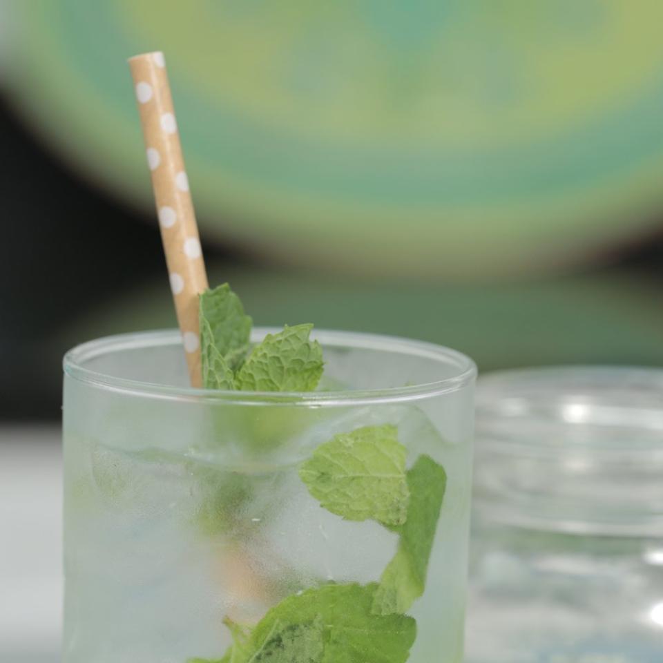 <p>The secret to a great mojito? Load it up with fresh mint and lime. </p> <p><a href="https://www.myrecipes.com/recipe/super-easy-mojito" rel="nofollow noopener" target="_blank" data-ylk="slk:Super-Easy Mojito Recipe;elm:context_link;itc:0;sec:content-canvas" class="link ">Super-Easy Mojito Recipe</a></p>